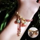 thumbnail image 3 of Wmhnj Pulsera tnica ajustable hecha a mano con cuerda y smbolo mitolgico del pez tragador dorado, ideal como regalo para la transformacin espiritual., 3 of 9