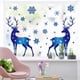 thumbnail image 2 of Las ventanas de farfi están pegadas con copos de nieve estáticos, los alces están estampados y los lindos factores navideños están pegados en casa., 2 of 5
