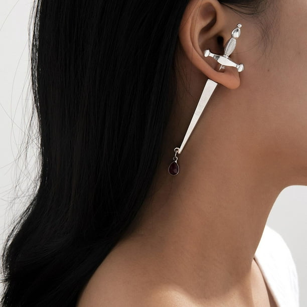 Hanging hotsell cross piercing
