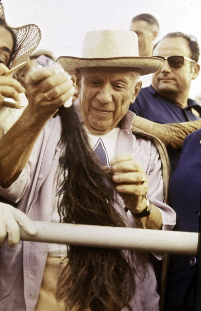 Pablo Picasso holding hair Photo Print (24 x 30)