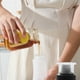 thumbnail image 4 of Botella exprimible para condimentos de 350 ml (11 oz) | Dispensador con tapa abatible para aceite, salsas y glaseado | Plástico apto para uso alimentario | Incluye 1 botella, 4 of 7
