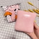 thumbnail image 1 of Juguete antiestrés squishy de pan con mantequilla de acción lenta, rosa, 1 of 6