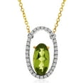 thumbnail image 1 of 14K Two Toned Oblong Peridot and Diamond Pendant with 18" Chain, 1 of 3