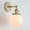 Antique Brass, variant on Permo Vintage Industrial Wall Sconce Lighting Fixture with Mini 5.9" Round Globe Milk White Glass Hand Blown Shade (Anqitue)