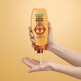 thumbnail image 5 of Garnier Whole Blends Repairing Conditioner with Honey Beeswax, 3 fl oz, 5 of 9