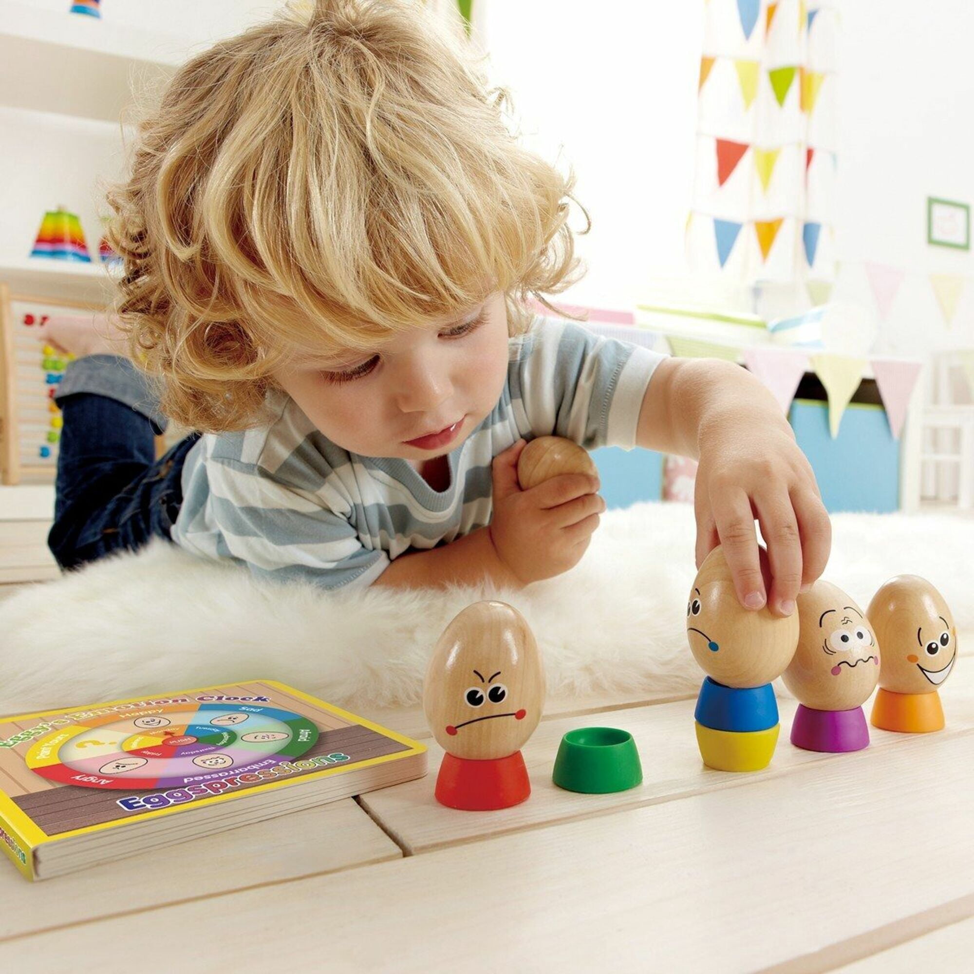 Hape Eggspressions Wooden Learning Toy with Illustrative Book, 13 Pieces