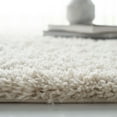 thumbnail image 4 of SAFAVIEH Fontana Jamie Solid Shag Runner Rug, Creme, 2'3" x 14', 4 of 7