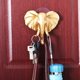 thumbnail image 1 of Gancho autoadhesivo para puerta o pared con forma de cabeza de elefante, ideal para colgar bolsos y llaves., 1 of 4