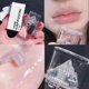 thumbnail image 2 of Brillo de labios Ice Mountain, aceite de labios de miel negra, esmalte de labios de gelatina de cristal, hidratante, transparente, resistente al agua, cosméticos de maquillaje, 2 of 5