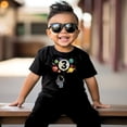 thumbnail image 4 of Olive Loves Apple 3rd Birthday Rocket Astronaut Themed T-Shirts with Moon Balloon and Planets for Boys and Girls Black Shirt 5-6, 4 of 6