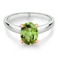 thumbnail image 2 of Gem Stone King 2.10 Ct Oval Green Peridot 925 Silver and 10K Rose Gold Ring Ring (Size 8), 2 of 4