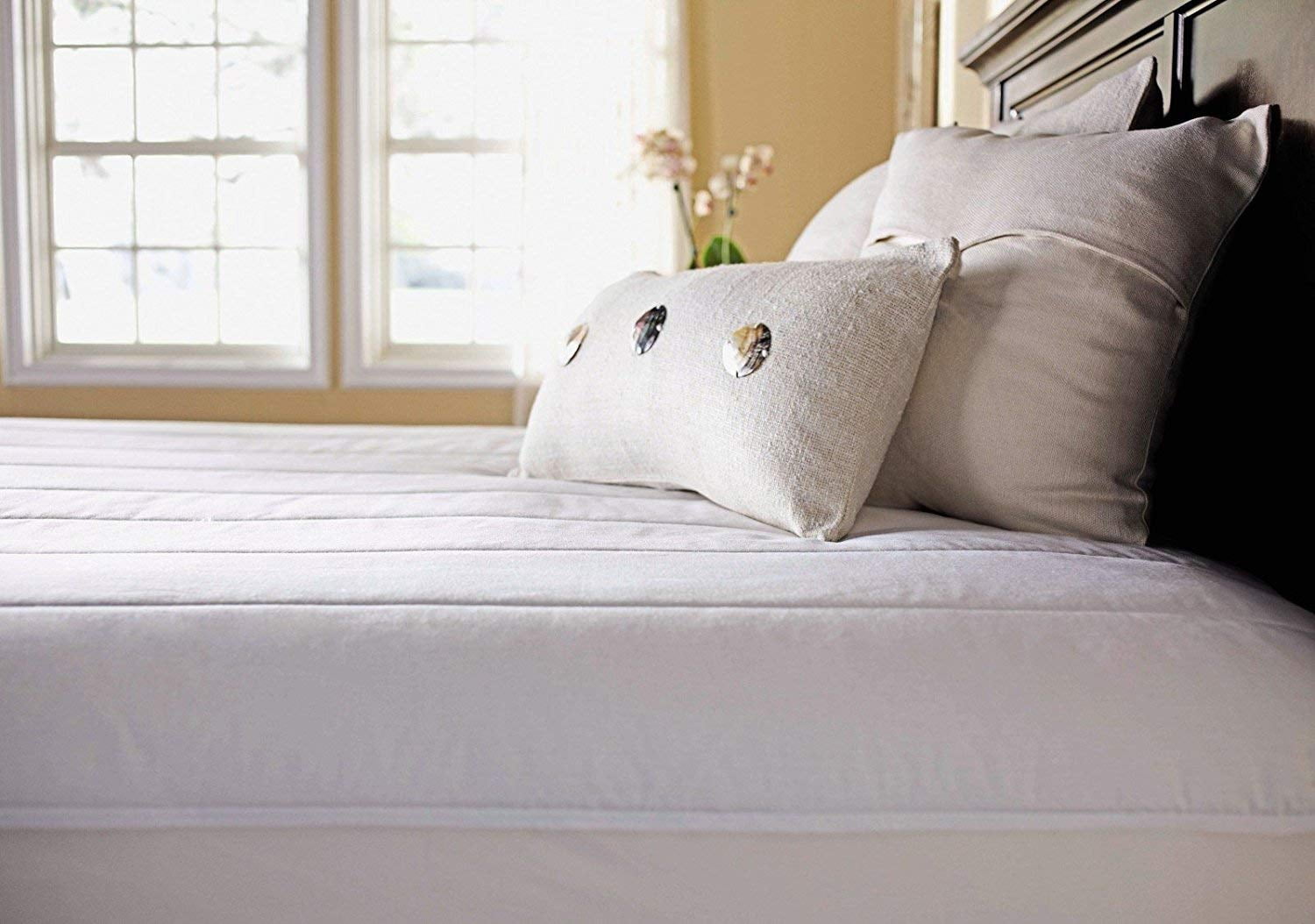 Photo 1 of **PREVIOUSLY OPENED**
Sunbeam Heated Mattress Pad