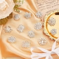 thumbnail image 2 of Kit de 12 broches de diamantes de imitación transparentes con forma de flor, corona, rombo y estrella, en color plata., 2 of 7