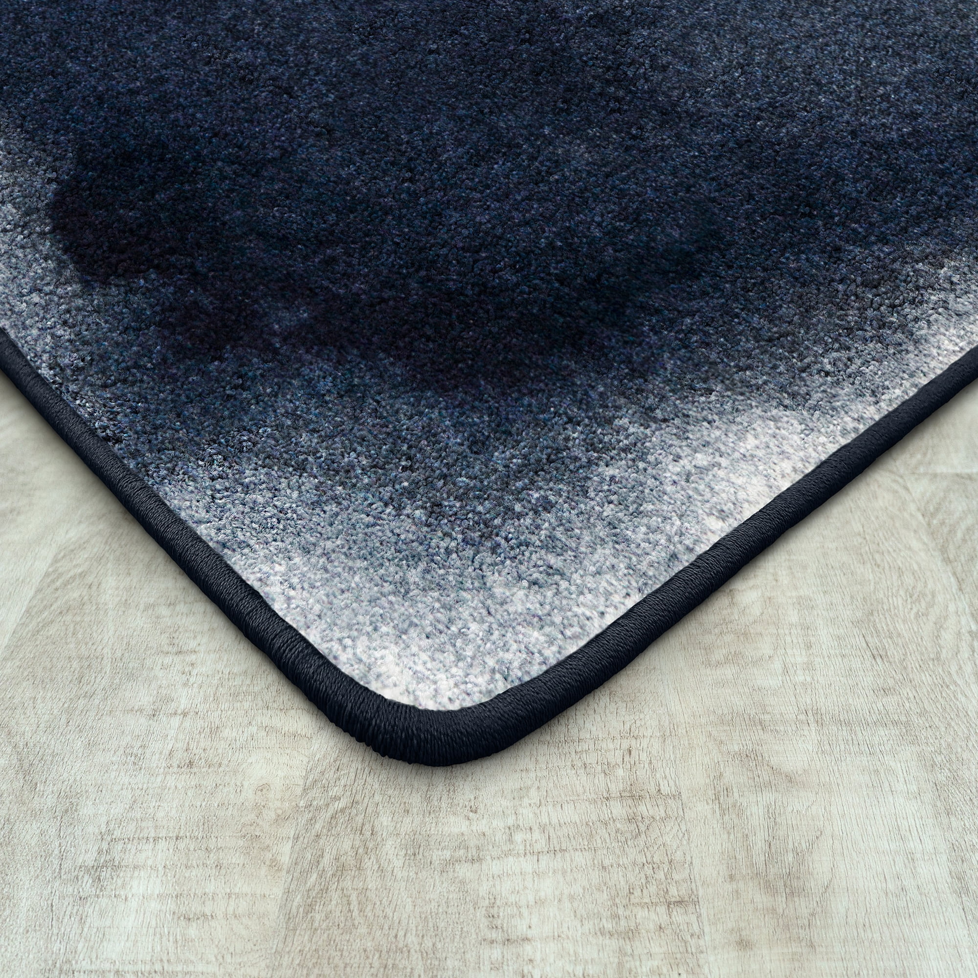 Joy Carpets Deep End 5'4" x 7'8" Area Rug in color Blue