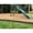 Multi-color, variant on WEATHERED WOOD Curved Playground Border 16’ – 2” Profile