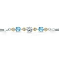 thumbnail image 2 of Gem Stone King 925 Sterling Silver and 10k Yellow Gold White Moissanite Swiss Blue Topaz and Lab Grown Diamond Bracelet for Women (3.28 Cttw, Round 7MM and 6MM, 6.5/7/7.5 inch, Made in Italy), 2 of 4