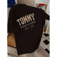 thumbnail image 1 of T-Shirt Graphique "Tommy" pour Femmes - Col Rond Décontracté Manches Courtes, Bleu Clair avec Lettrage Doré, Haut de Mode d'Été pour Tenue Décontractée, T-Shirt pour Dames, 1 of 7