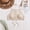 Beige, variant on 2026 Bohemian Ethnic Style Sexy Knit Backless Short Crop Top For Women Lightweight Hollow Out Crochet Tassels Hem Halter Bras Bustier