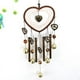 thumbnail image 1 of Xihbxyly Campana de Viento con Forma de Corazón, Diseño de Atrapasueños, Decoración Bohemia para Exteriores, Sonido Dulce con Campanas de Aluminio y Hierro, Decoración de Jardín, Sueño Relajante (Jue, 1 of 7