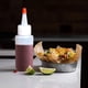 thumbnail image 5 of Paquete de 20 botellas dispensadoras de plástico de 59 ml (2 oz) con tapa roja - Ideales para manualidades, pegamento y otros usos., 5 of 9