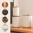 thumbnail image 5 of Black Ceramic Canister Set with Wooden Lids – 3-Piece Airtight Food Storage Jars for Kitchen, Embossed Design, Small/Medium/Large Sizes (30/48/82 oz) – Flour, Sugar, Coffee, Tea Containers, 5 of 10