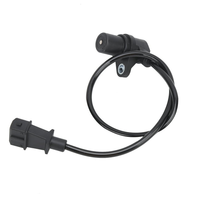 sensor de posición del cigüeñal del motor reemplazo del sensor de posición del cigüeñal salida de alta intensidad del sensor de posición del cigüeñal. Sensor de cigüeñal negro de ABS y metal con conector eléctrico de 3 pines y cable, vista cenital sobre fondo blanco; montaje para Nissan Cabstar/Terrano II, detecta velocidad del motor y posición para sincronización de inyección y encendido, instalación directa como reemplazo; a menudo usado también para controlar la velocidad de ralentí y la evaporación de combustible.