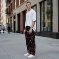 thumbnail image 6 of Men's pajama pants with brown football and playbook pattern on black background， soft home pajama pants， casual and comfortable loose fit pajama pants， elastic waistband, 6 of 10