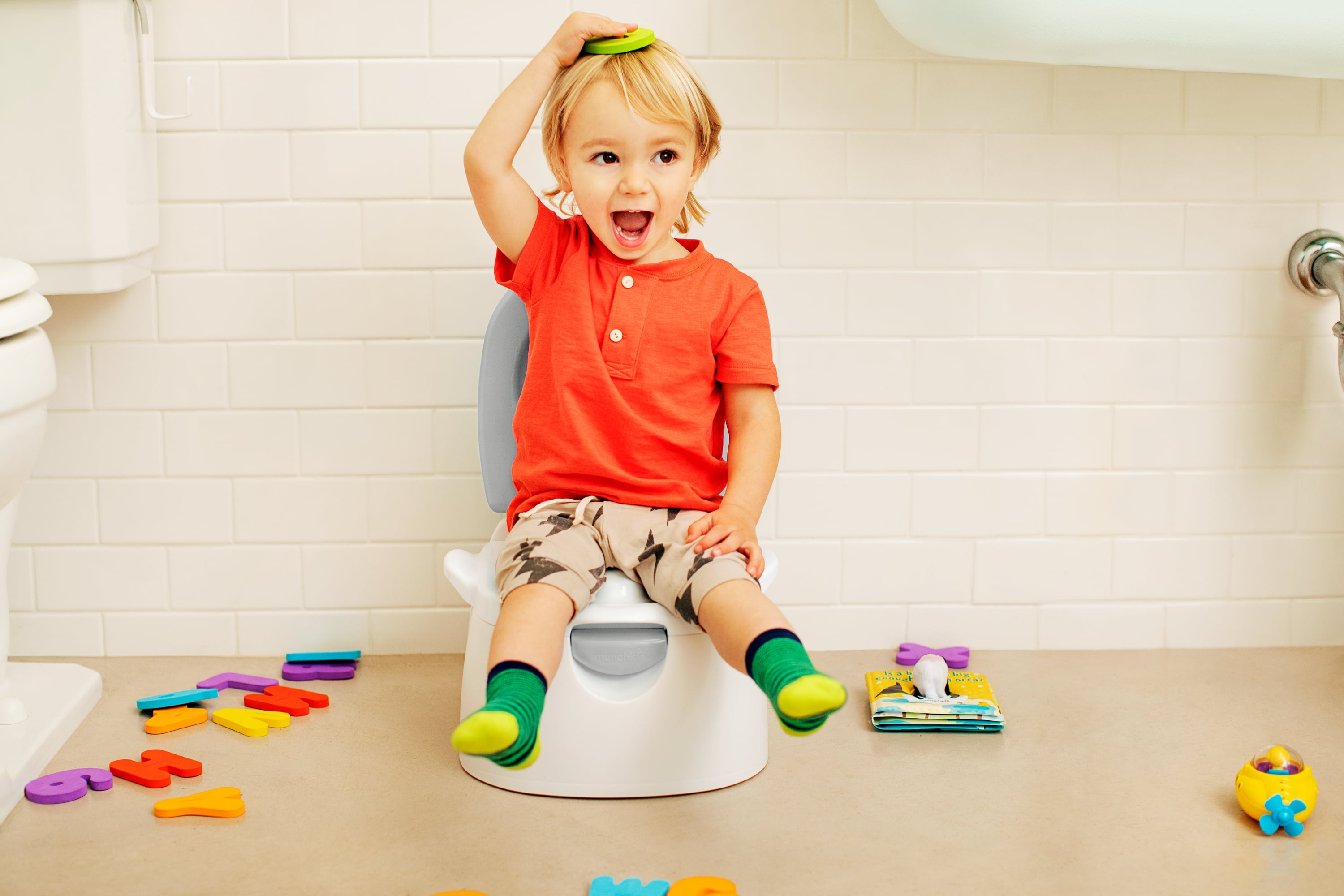 Munchkin Multi-Stage 3-in-1 Toddler Potty Seat, Trainer Ring, and Step Stool, White