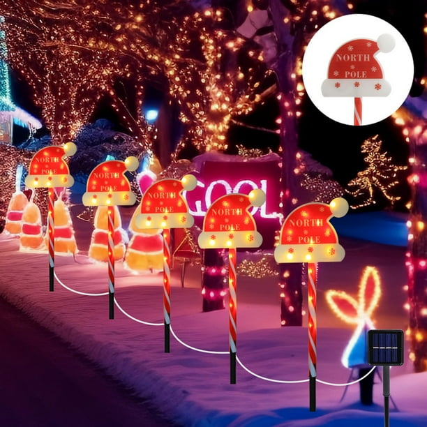 Luces solares LED navideñas con forma de gorro navideño, luz solar cálida para jardín o patio. Decoración navideña para exteriores. Incluye cinco luces solares navideñas de plástico.