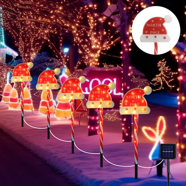 Luces solares LED navideñas con forma de gorro navideño, luz solar cálida para jardín o patio. Decoración navideña para exteriores. Incluye cinco luces solares navideñas de plástico.