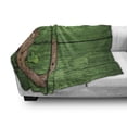 thumbnail image 2 of Clover Soft Flannel Fleece Throw Blanket, Luck Charms Rusty Horseshoe Little Shamrock on Wooden Backdrop, Cozy Plush for Indoor and Outdoor Use, 60" x 80", Green Pale Redwood, by Ambesonne, 2 of 5