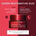thumbnail image 2 of Crema superrestauradora de día y noche Clarins para el cuidado de la piel, 50 ml, 2 of 6