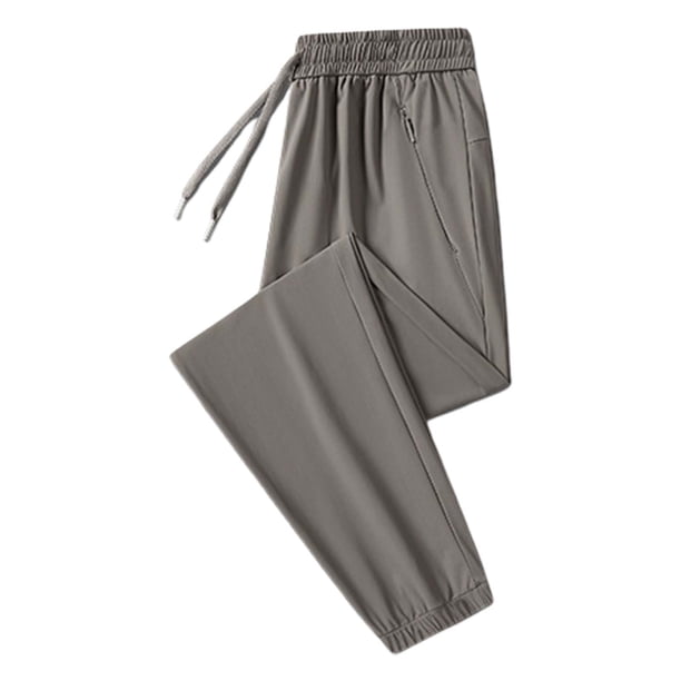 Pantalones unisex elásticos de secado rápido para hombre: cintura elástica con cordón, corte informal, tejido ligero de nailon y spandex, lavables a máquina. Tallas: L-XXXXXL.