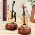 thumbnail image 4 of Artistic Traditional Chinese Guqin Shaped Music Box - Decorative Octave Box for Home Display, High-Quality Durable Ornament, Perfect Gift for Music Lovers, Compact Size Decor Piece (YL2049), 4 of 6