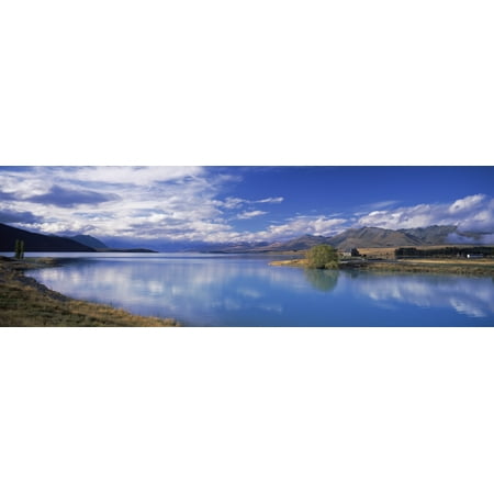 Fiordland National Park - Reflection of clouds in a lake Fiordland National Park South Island New Zealand Canvas Art - Panoramic Images (6 x 18)