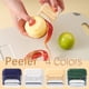 thumbnail image 1 of Pelador de Succión Magnético, Hoja Afilada de Doble Filo, Agarre Ergonómico, Pelado Fácil de Verduras y Frutas, Compartimento de Almacenamiento Integrado, Limpieza Sin Esfuerzo, Tamaño Compa, 1 of 2