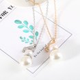 thumbnail image 1 of Juego de 2 piezas de collar con colgante de muñeco de nieve de Navidad, collar de perlas de imitación, cadena de suéter para mujeres, niñas, dorado, plateado JAMW Sencillez, 1 of 5