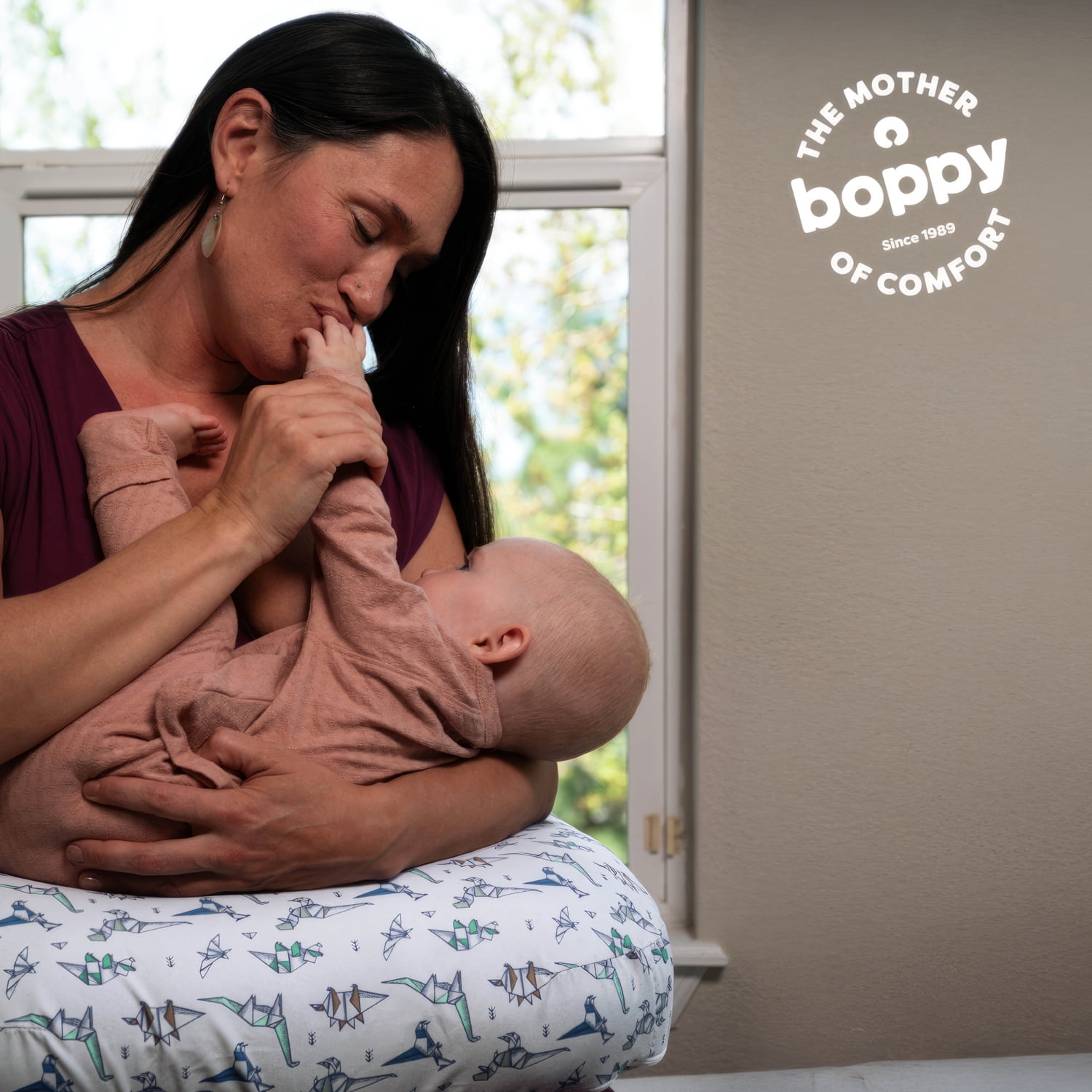 Boppy Nursing Pillow - Ergonomic Bottle & Breastfeeding Pillow with High, Firm, Large Area, Water-Repellant with Washable Cover;  Baby Safety Alliance Verified - Gray Geo Dinos
