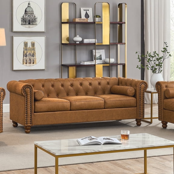 Luxurious Air Leather Chesterfield Sofa, 3-Seater with Rolled Arms, Tufted Design, Nailhead Accents, and Neck Roll Pillows for Cozy Living Spaces