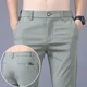 thumbnail image 3 of Pantalones para hombre, pantalones casuales formales de negocios para hombre, corte entallado, negros, elegantes, estilo Harajuku, poliéster, tendencia, venta de ropa de calle, novedad de verano, 3 of 5