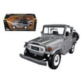 thumbnail image 1 of Toyota FJ40 FJ 40 Convertible Argent 1/24 Voiture Modèle Moulée sous Pression par Motormax, 1 of 5