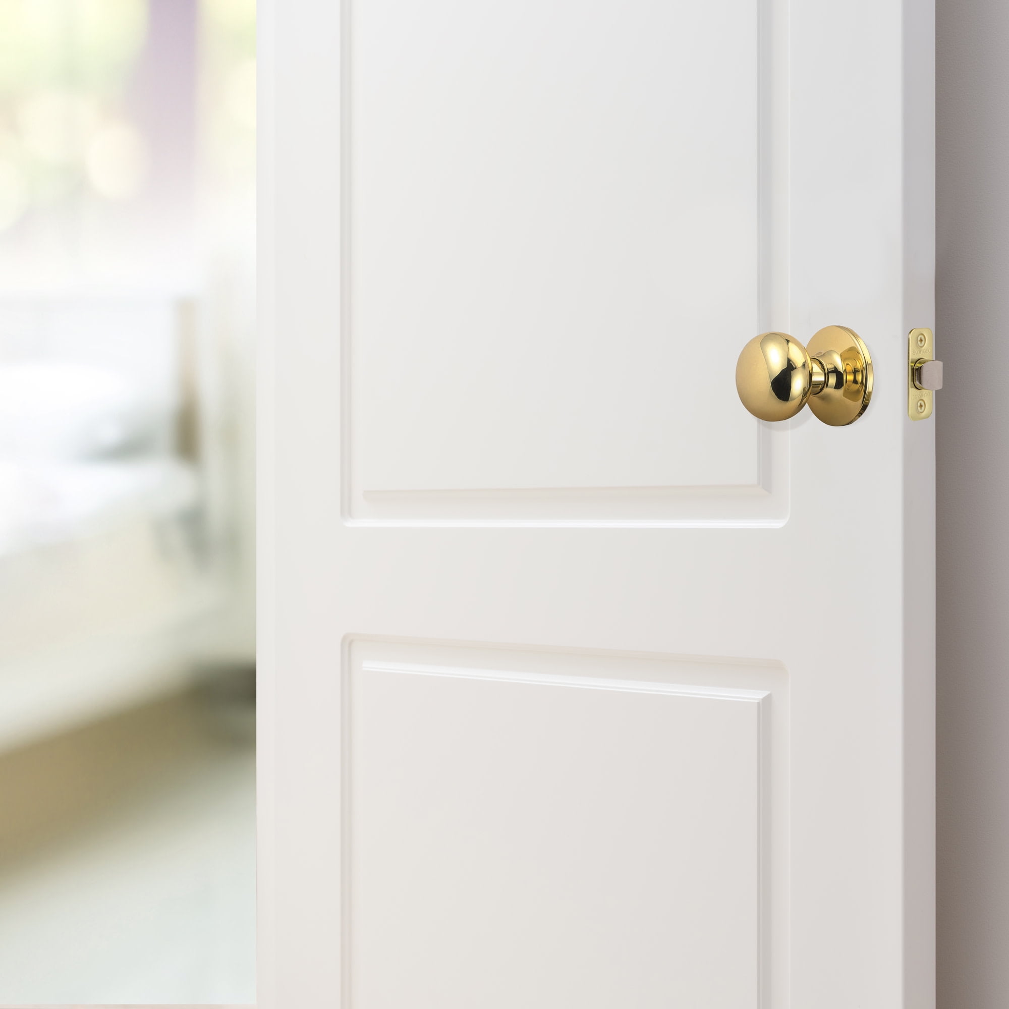 Design House Cambridge 2-Way Latch Interior Passage Door Knob, Polished Brass