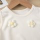 thumbnail image 4 of Conjunto de camiseta sin mangas con cuello redondo para niña, vestido sin mangas con botones finos para niña, falda francesa ceñida con cintura fruncida y volantes, conjunto de poliéster para niña, 4 of 6