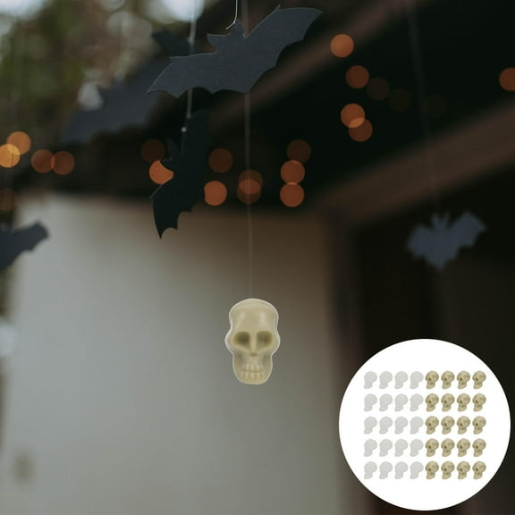 LEORX  Skull Ornament 100Pcs Original Color Plastic Mini Skulls Decor Scare Prop