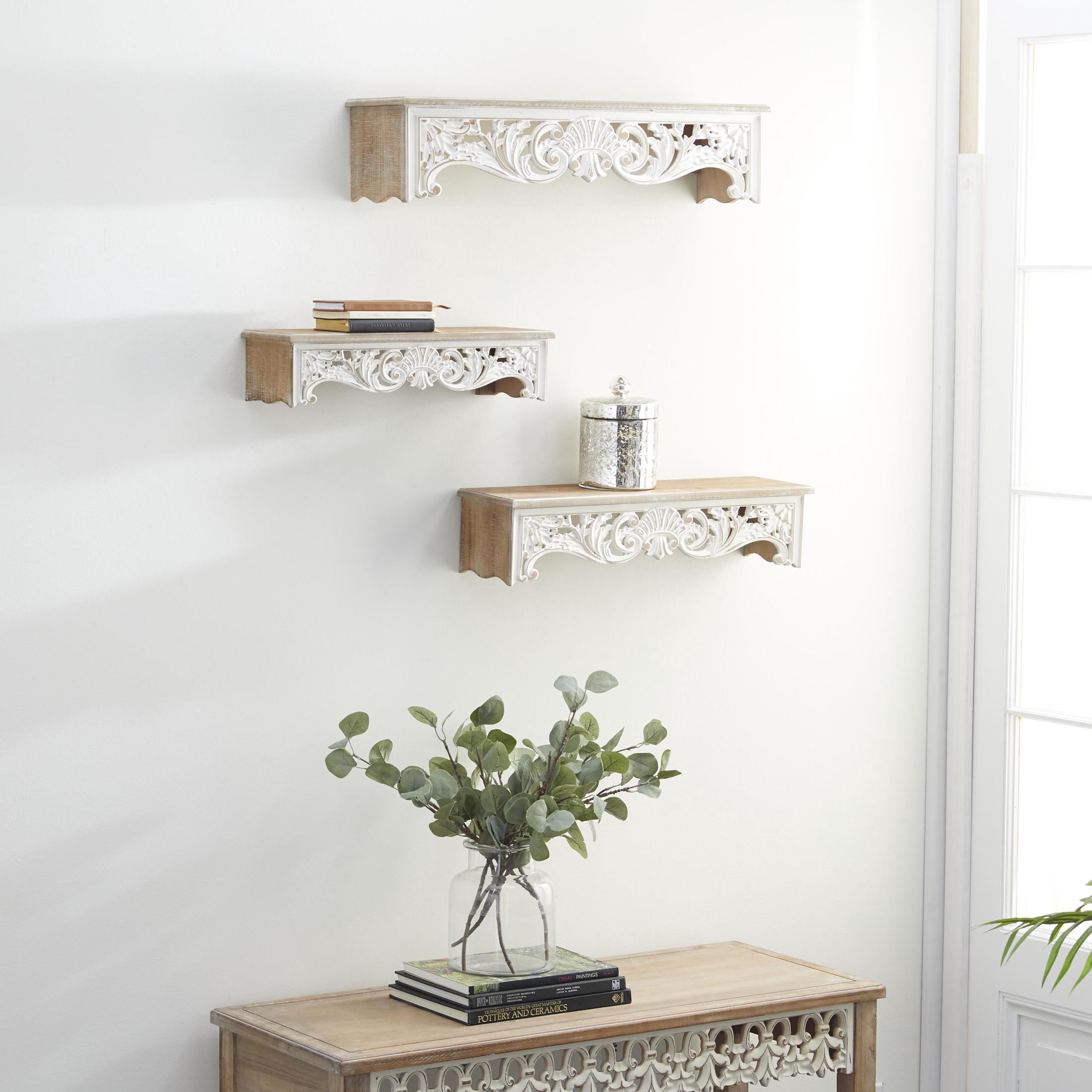 DecMode 19", 24", 28"W Carved 3-Tier Cream Scroll Wall Shelf (3 Count)