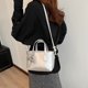 thumbnail image 2 of Bolso pequeño popular popular para mujer 2024 nuevo bolso de mensajero plateado versátil bolso de cubo portátil súper moderno, 2 of 5