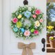 thumbnail image 1 of Corona de Pascua con flores y follaje artificiales | Decoración de primavera para la puerta principal o la pared | Corona decorativa de huevos para el hogar y la chimenea, 1 of 6