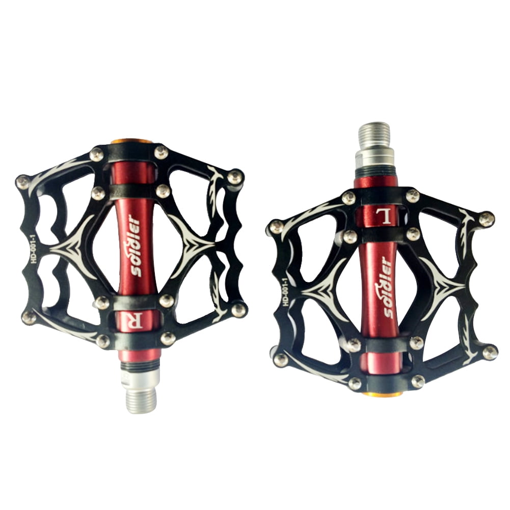 black and red mountain bike pedals