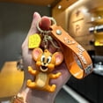 thumbnail image 1 of LLavero de Anime Tom Jerry para hombres y mujeres, llavero colgante de bolsa de muñeca con figura de dibujos animados, accesorios de llave de coche, regalo de Chian, 1 of 4
