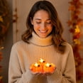 thumbnail image 5 of Halloween Mini Pumpkin Candle Lights—12 Pack, Flameless Short Electronic Candles for Halloween Party Home Indoor Decorations, 5 of 6